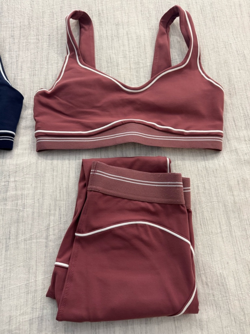 Dusty Rose Sports Bra with White Piping. Alo look alike.